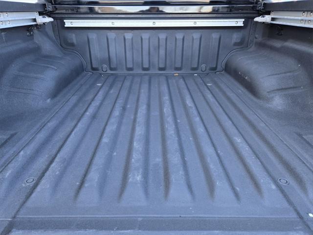 Photo of 2022 Super Black Nissan Frontier