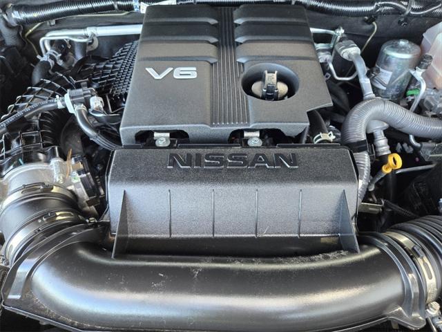Photo of 2023 Boulder Gray Pearl Nissan Frontier