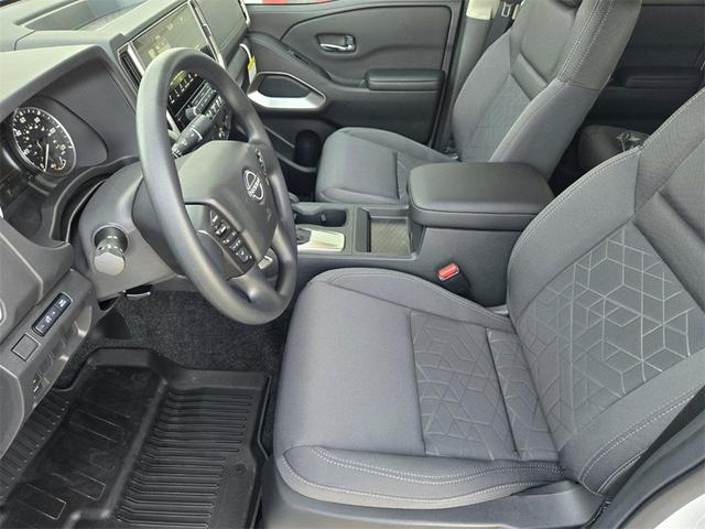 Photo of 2025 Glacier White Nissan Frontier