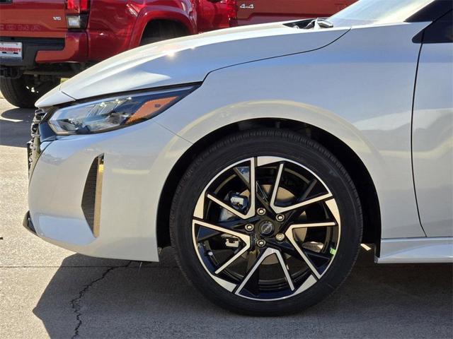 Photo of 2025 Aspen White Tricoat/Super Black Nissan Sentra