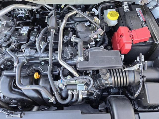 Photo of 2025 Aspen White Tricoat/Super Black Nissan Sentra