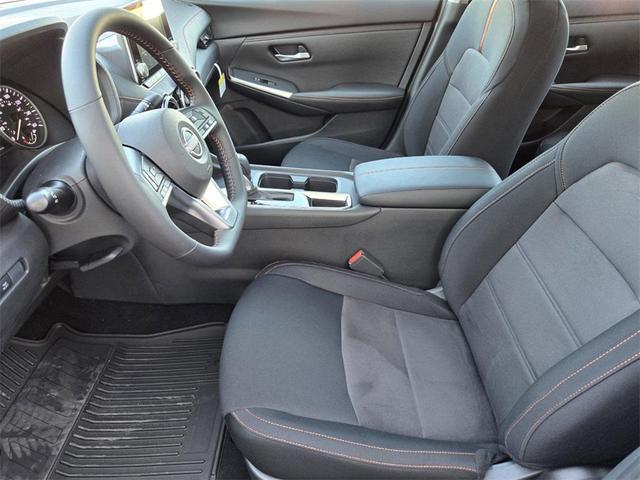Photo of 2025 Aspen White Tricoat/Super Black Nissan Sentra