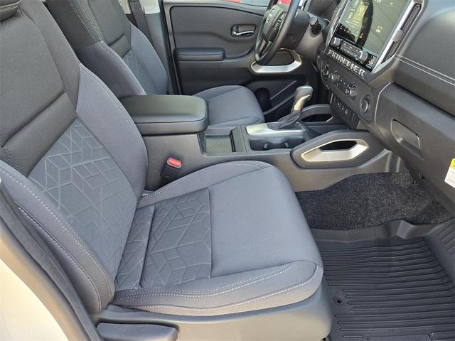 Photo of 2025 Glacier White Nissan Frontier