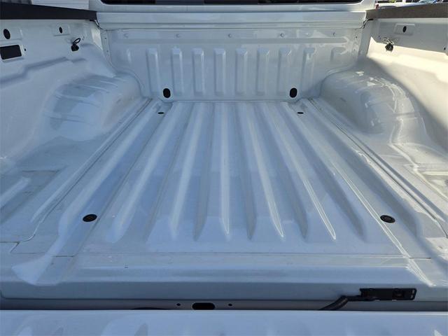 Photo of 2025 Glacier White Nissan Frontier