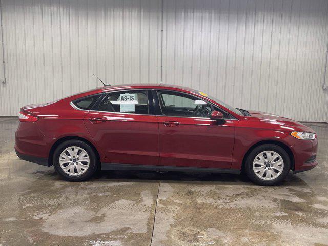 Photo of 2014 RUBY RED TINTED CLEARCOAT Ford Fusion