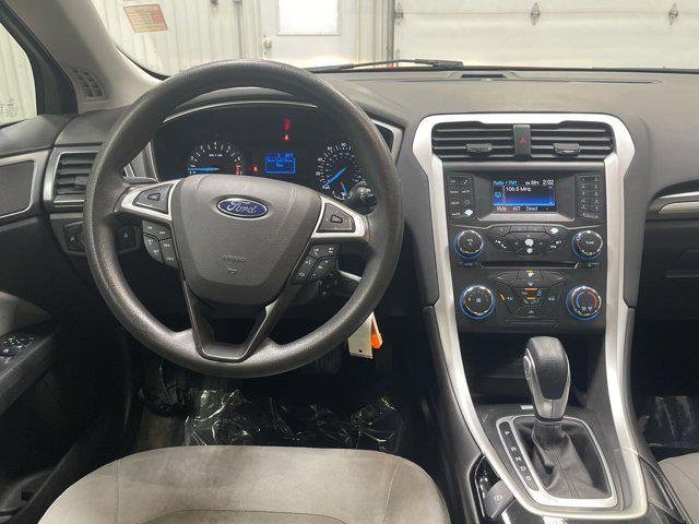 Photo of 2014 RUBY RED TINTED CLEARCOAT Ford Fusion