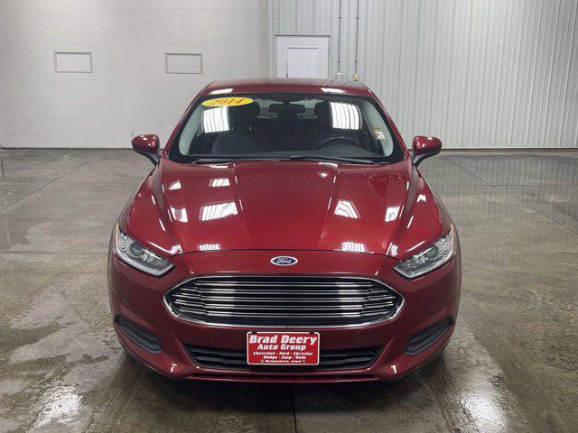 Photo of 2014 RUBY RED TINTED CLEARCOAT Ford Fusion