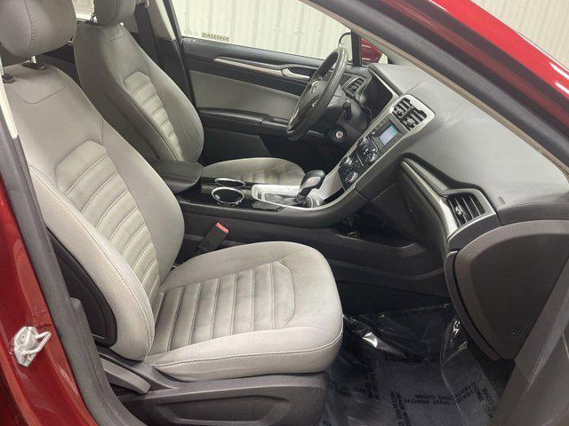 Photo of 2014 RUBY RED TINTED CLEARCOAT Ford Fusion