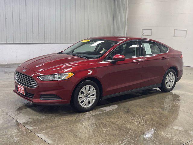 Photo of 2014 RUBY RED TINTED CLEARCOAT Ford Fusion