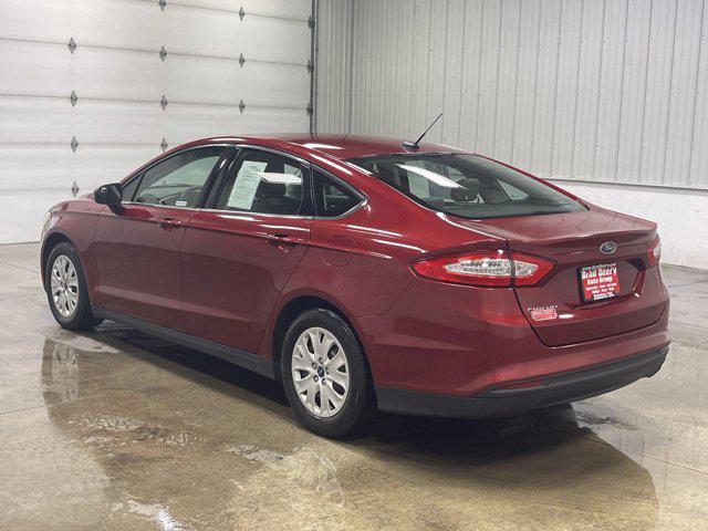 Photo of 2014 RUBY RED TINTED CLEARCOAT Ford Fusion