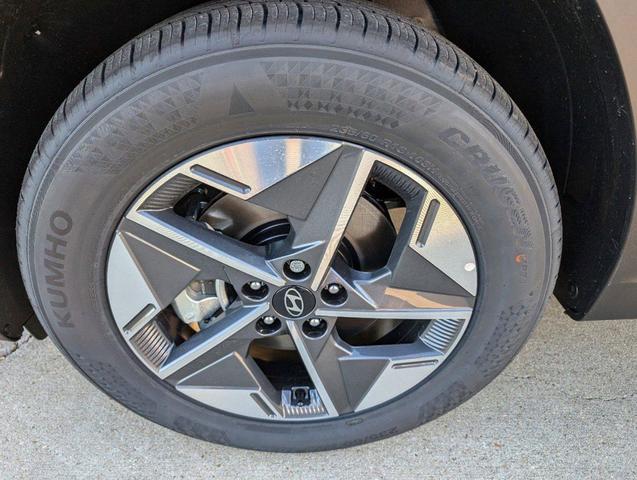 Photo of 2025 Serenity White Pearl Hyundai TUCSON