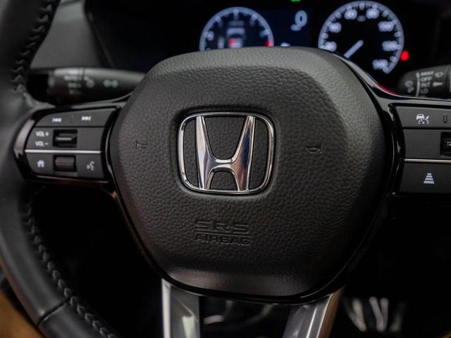 Photo of 2025 Radiant Red Metallic Honda CR-V
