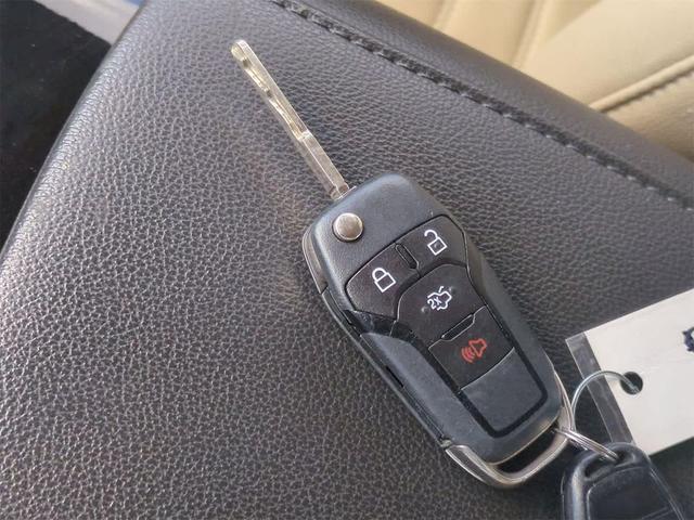 Photo of 2014 Ice Storm Metallic Ford Fusion Hybrid