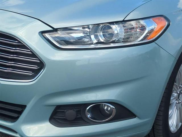 Photo of 2014 Ice Storm Metallic Ford Fusion Hybrid
