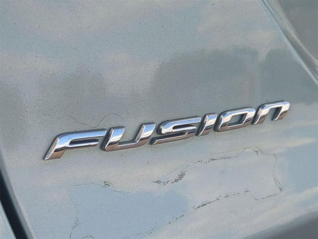 Photo of 2014 Ice Storm Metallic Ford Fusion Hybrid