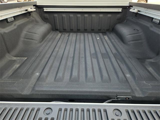 Photo of 2024 Glacier White Nissan Frontier