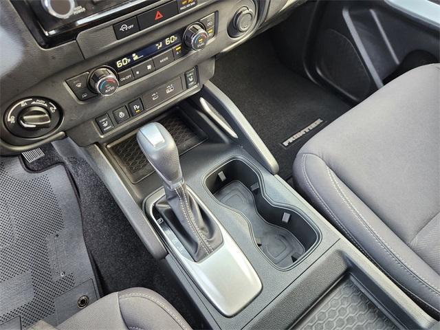 Photo of 2024 Glacier White Nissan Frontier