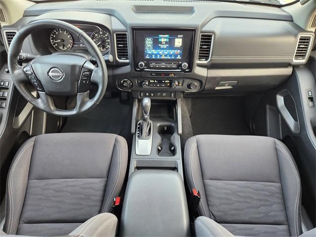Photo of 2024 Glacier White Nissan Frontier