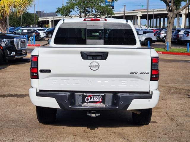 Photo of 2024 Glacier White Nissan Frontier