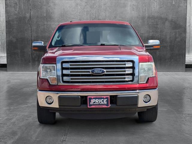 Photo of 2013 Ruby Red Metallic Tinted Clearcoat Ford F-150