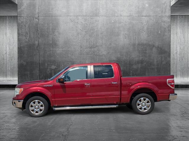 Photo of 2013 Ruby Red Metallic Tinted Clearcoat Ford F-150