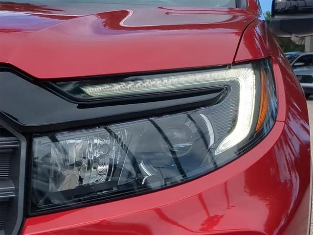 Photo of 2024 Radiant Red Metallic II Honda Passport