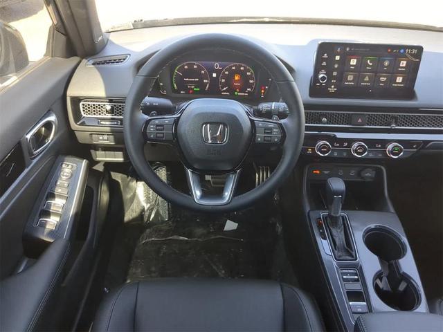 Photo of 2025 Crystal Black Pearl Honda Civic Hybrid