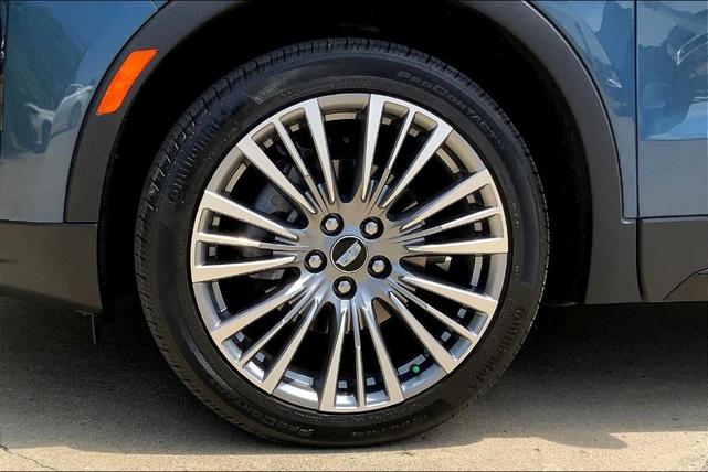 Photo of 2025 Deep Sea Metallic Cadillac XT4