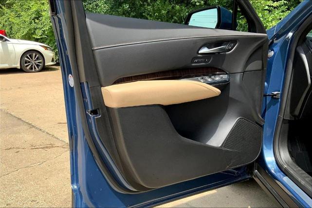 Photo of 2025 Deep Sea Metallic Cadillac XT4