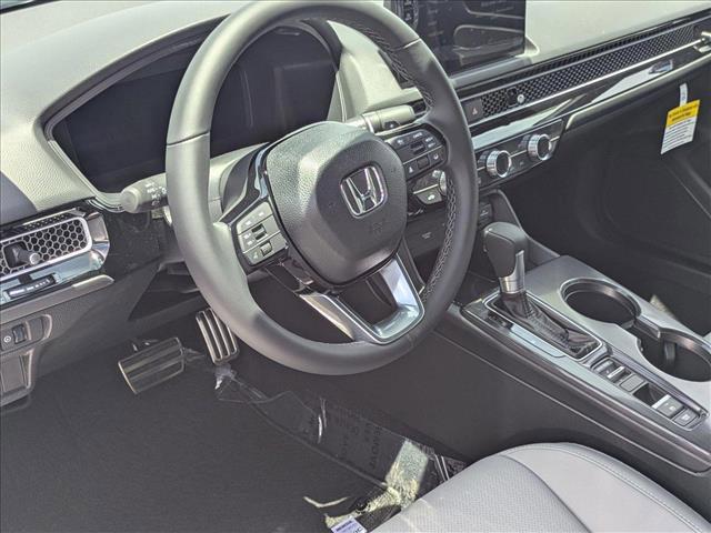 Photo of 2025 Platinum White Pearl Honda Civic Hybrid