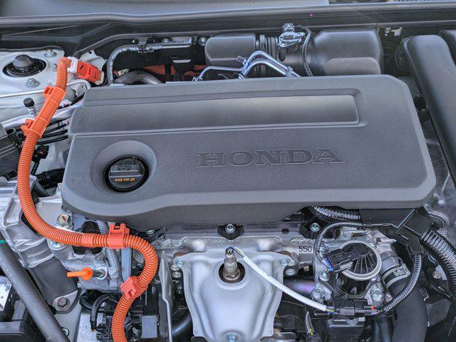 Photo of 2025 Platinum White Pearl Honda Civic Hybrid