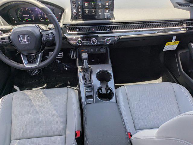 Photo of 2025 Platinum White Pearl Honda Civic Hybrid