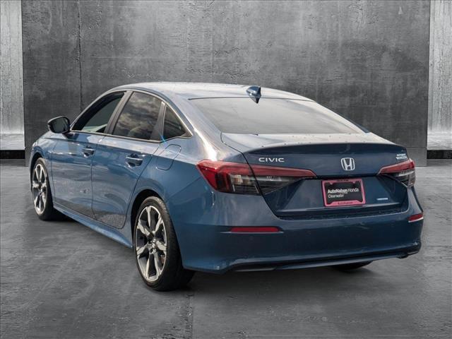 Photo of 2025 Blue Lagoon Pearl Honda Civic Hybrid