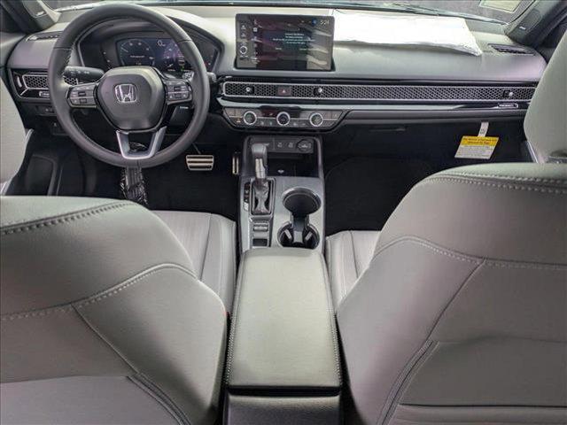 Photo of 2025 Blue Lagoon Pearl Honda Civic Hybrid