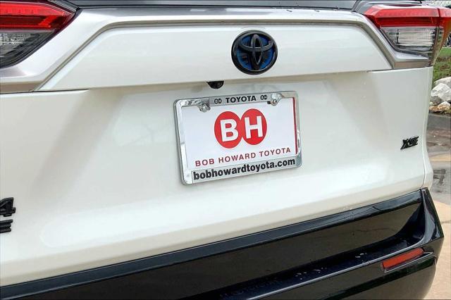 Photo of 2023 Wind Chill Pearl/Midnight Black Metallic Toyota RAV4 Prime