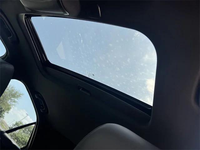 Photo of 2025 Summit White Cadillac CT4