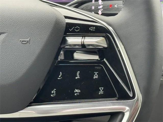 Photo of 2025 Black Raven Cadillac Escalade IQ