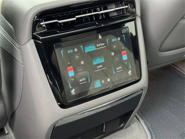 Photo of 2025 Black Raven Cadillac Escalade IQ
