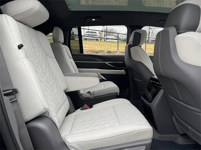 Photo of 2025 Black Raven Cadillac Escalade IQ