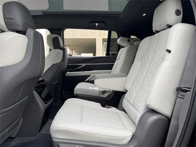 Photo of 2025 Black Raven Cadillac Escalade IQ