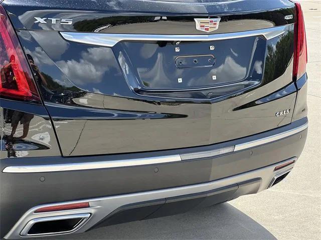 Photo of 2024 Stellar Black Metallic Cadillac XT5