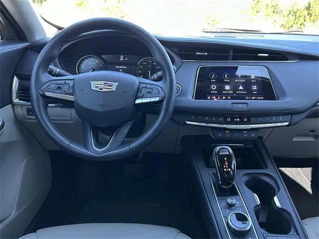 Photo of 2023 Stellar Black Metallic Cadillac XT4