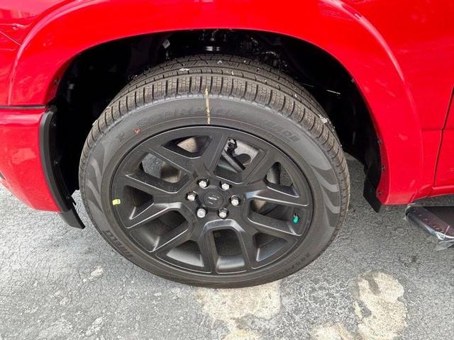 Photo of 2025 Flame Red Clearcoat RAM 1500