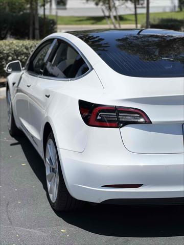 Photo of 2019 Pearl White Multi-Coat Tesla Model 3