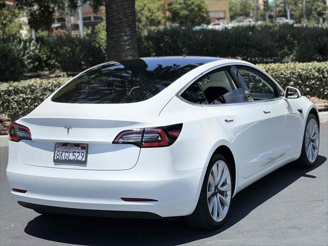 Photo of 2019 Pearl White Multi-Coat Tesla Model 3