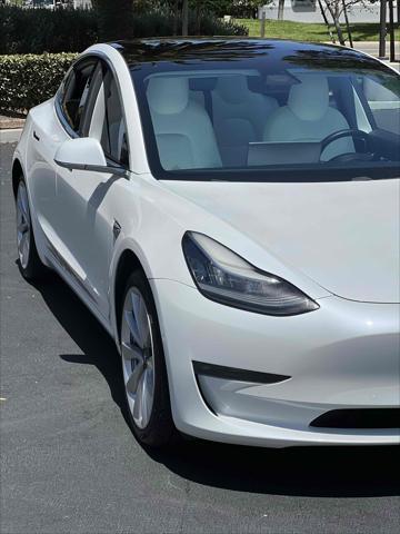Photo of 2019 Pearl White Multi-Coat Tesla Model 3