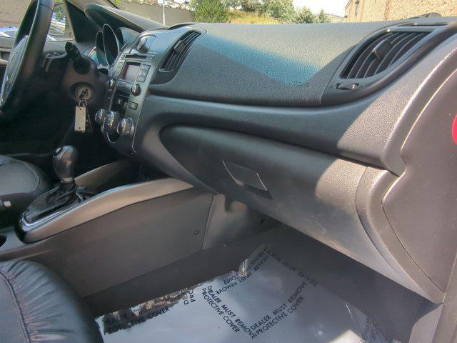Photo of 2011 Bright Silver Metallic Kia Forte