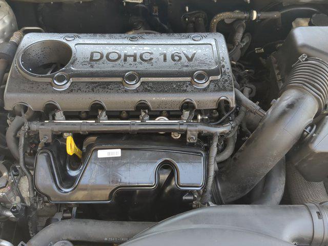 Photo of 2011 Bright Silver Metallic Kia Forte