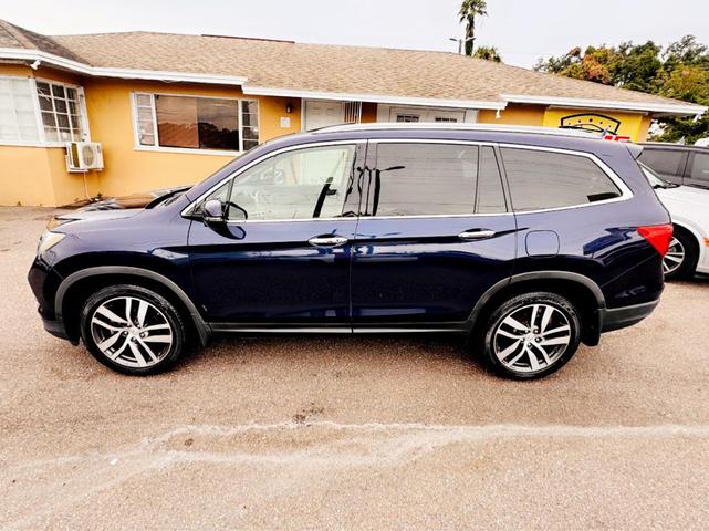 Photo of 2016 BLUE Honda Pilot