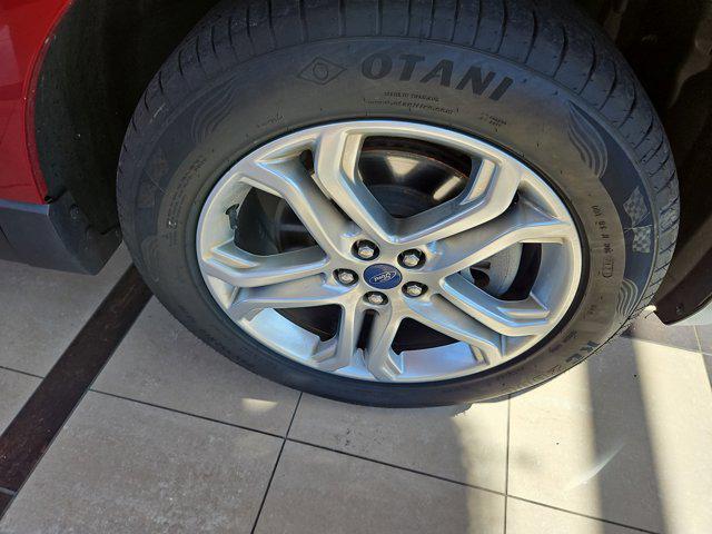 Photo of 2018 Ruby Red Metallic Tinted Clearcoat Ford Edge